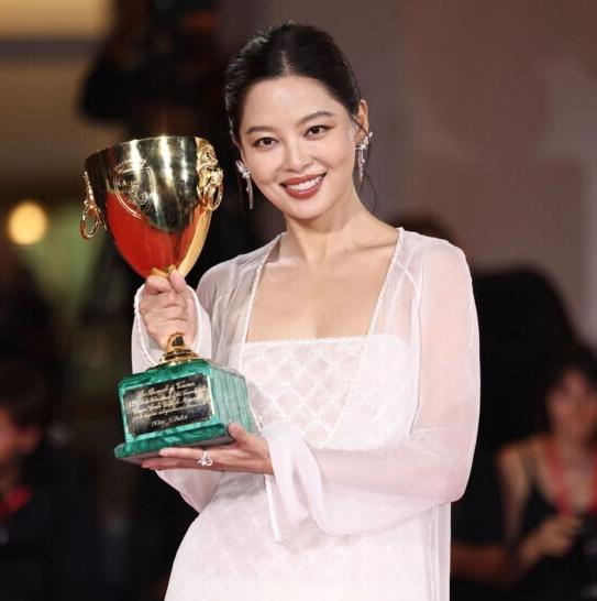 Xin Zhilei wins best actress award at Venice for her role in a Guangdong film