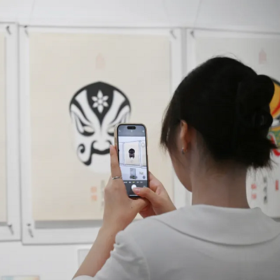 Cantonese Opera mask show opens in Tianhe