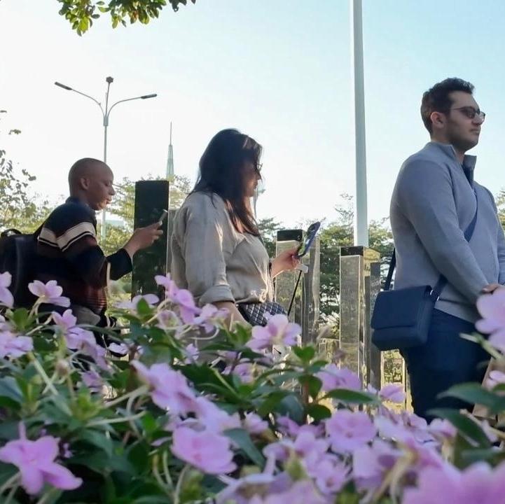 Youth from 10 countries discover Guangzhou's green vision at autumn garden expo